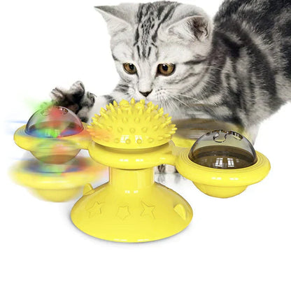 Gelbes Katzenspielzeug mit rotierenden Kugeln, interaktiv, Kunststoff, für Unterhaltung und Bewegung.
