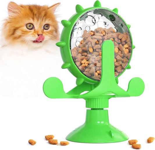Grüner Katzenspielzeug-Futterspender mit Saugnapf, rotierbar, gefüllt mit Trockenfutter.