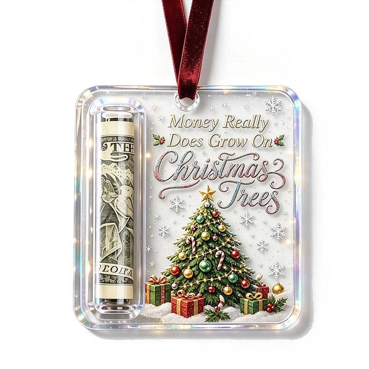 Anhänger mit geschmücktem Weihnachtsbaum und Geschenken, links das Fach mit aufgerollter Geldnote, am roten Samtband. 15