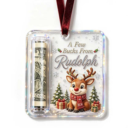 Anhänger mit niedlichem Rentier mit rotem Schal zwischen Tannen und Geschenken, links die eingerollte Geldnote. 17