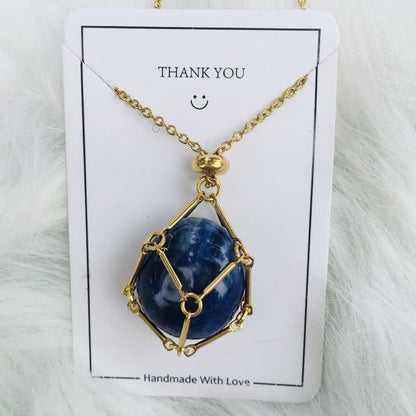 Blauer Edelstein-Anhänger mit goldener Kette, handgefertigter Schmuck, Geschenkidee.