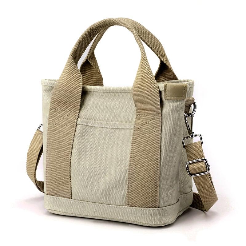 Beige Canvas-Umhängetasche für Damen, kleine Größe, verstellbarer Riemen, modisch und praktisch.
