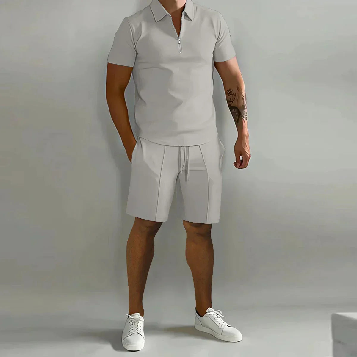Herren-Trainingsanzug, graues Poloshirt, kurze Ärmel, Sportshorts, Sommermode.