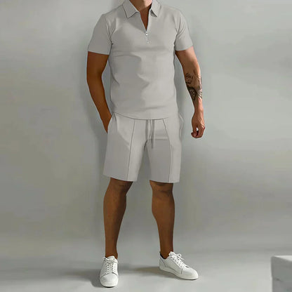 Herren-Trainingsanzug, graues Poloshirt, kurze Ärmel, Sportshorts, Sommermode.