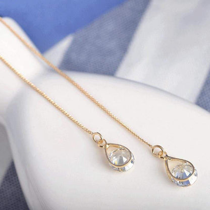 Goldene lange Tropfen Strass Ohrringe, eleganter Schmuck, funkelnd, modisch, Damenaccessoire.
