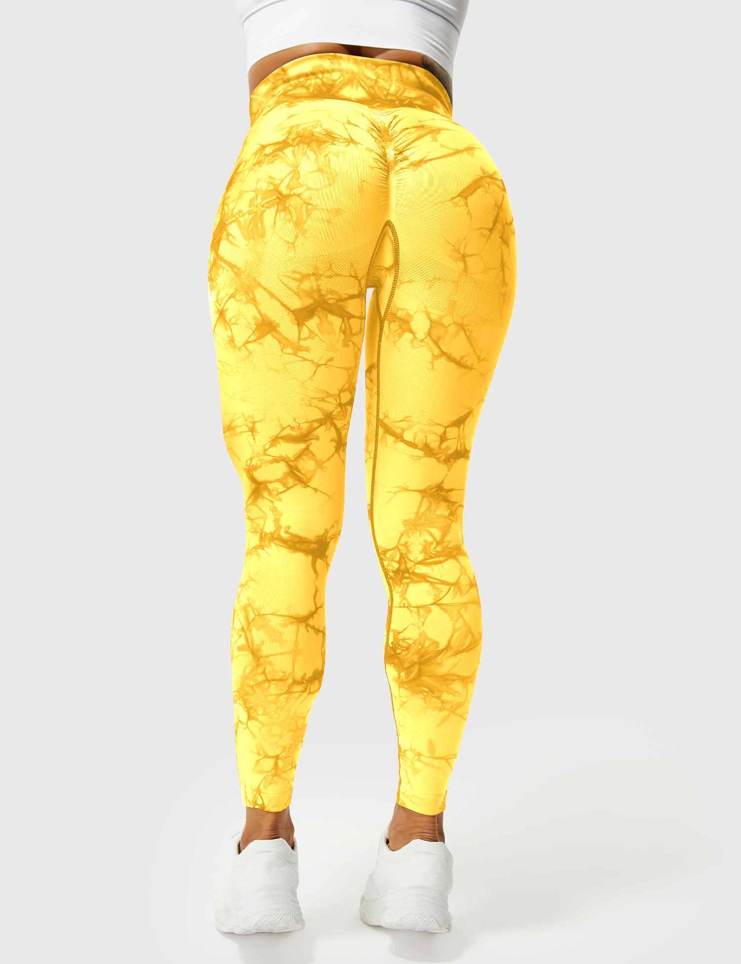 Gelbe Damen-Leggings mit Marmormuster, hoch tailliert, sportlich, elastisch, bequem.
