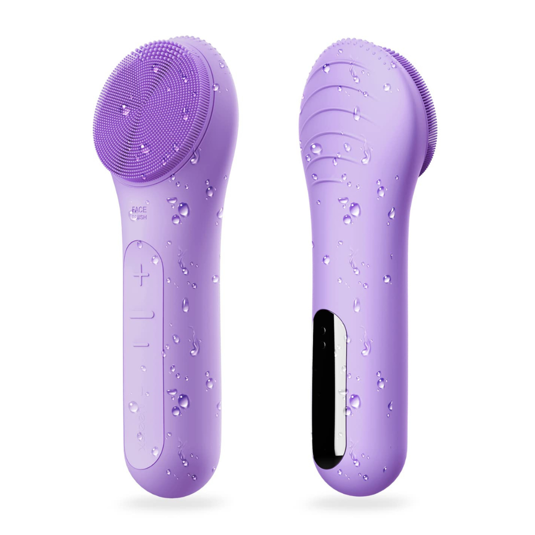 Lila Silikon-Gesichtsreinigungsbürste, wasserdicht, elektrisch, mit Massagefunktion.