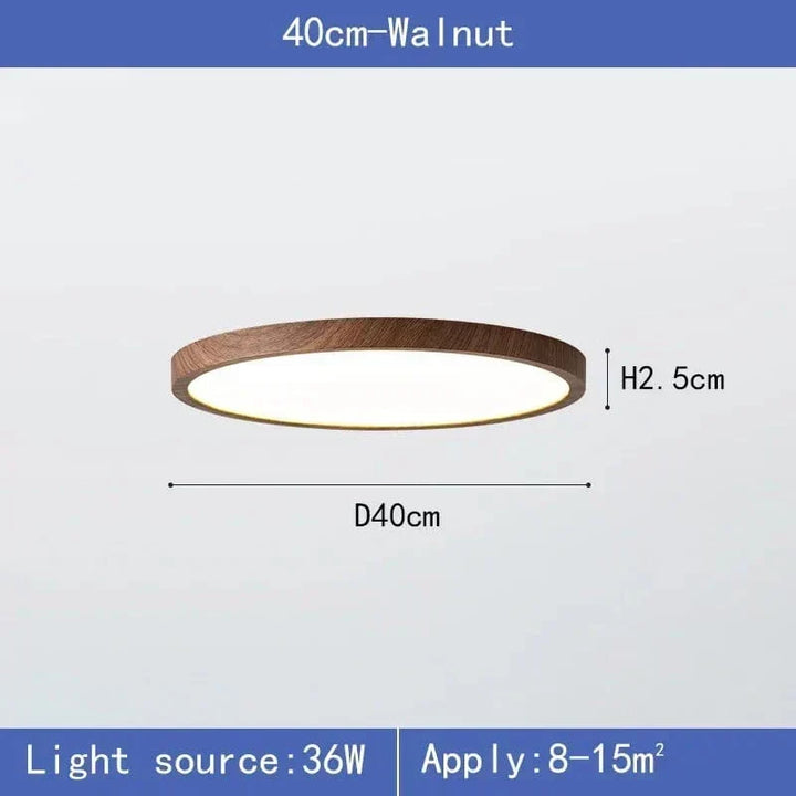 Maßgrafik der Leuchte in dunkler Nussbaum-Optik mit 40 cm Durchmesser und 2,5 cm Höhe, Leistungs- und Raumgrößenangabe darunter. 10