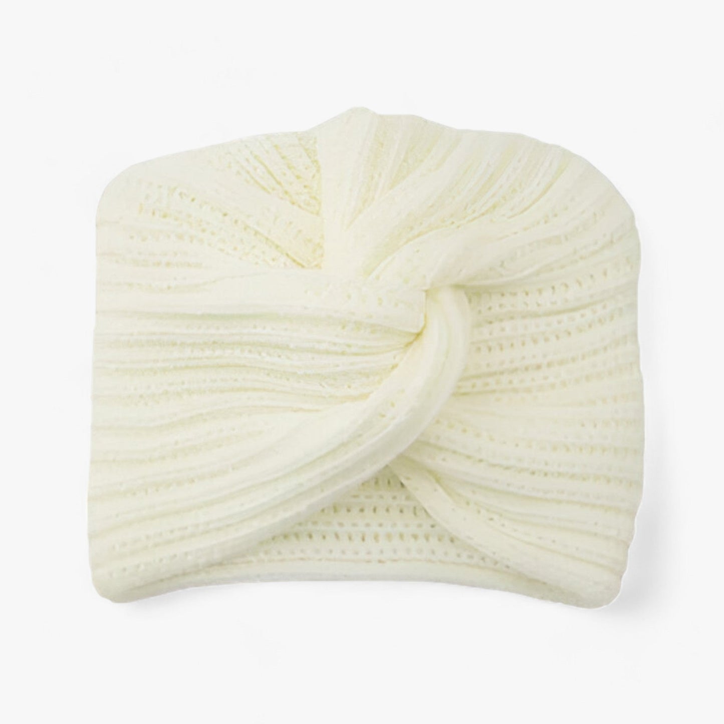 Cremefarbener gestrickter Turban aus Baumwolle, stilvolles Accessoire für Damenmode.