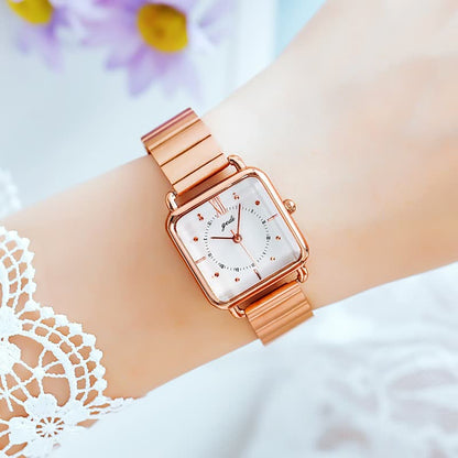 Roségoldene Damenuhr mit quadratischem Zifferblatt, Edelstahlarmband, elegant und modisch.