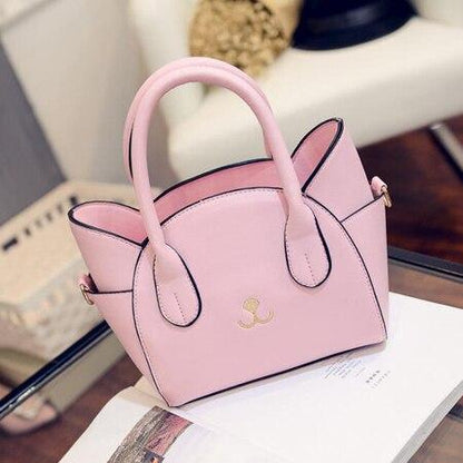 Rosa Handtasche aus Leder mit Katzendesign, modisch und elegant, ideal für Damen.