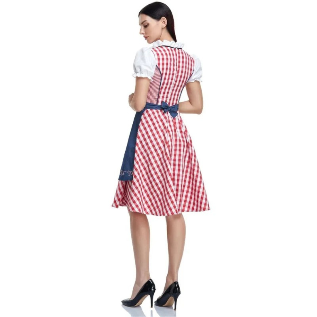 Rückansicht des Dirndls mit rot-weiß kariertem Rücken, Schleife der blauen Schürze und Puffärmeln, Model blickt zur Seite. 8
