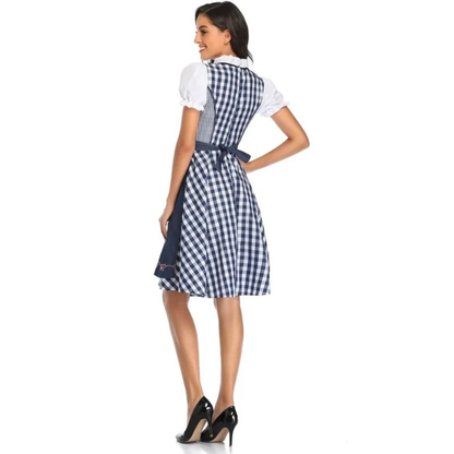 Rückansicht des Dirndls in Marineblau mit blau-weiß kariertem Rücken, Schürzenschleife und weißen Puffärmeln. 11