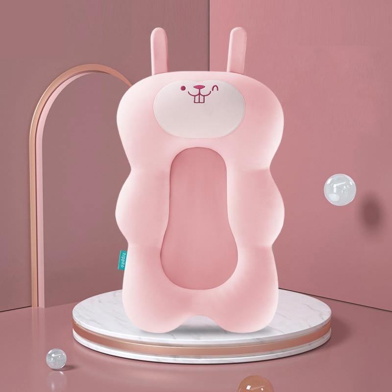 Rosa Anti-Rutsch-Baby-Badewannenkissen in Hasenform, weich und ergonomisch.