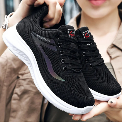 Schwarze Sportschuhe mit weicher Sohle, atmungsaktiv, modisch, ideal für Laufen und Freizeit.