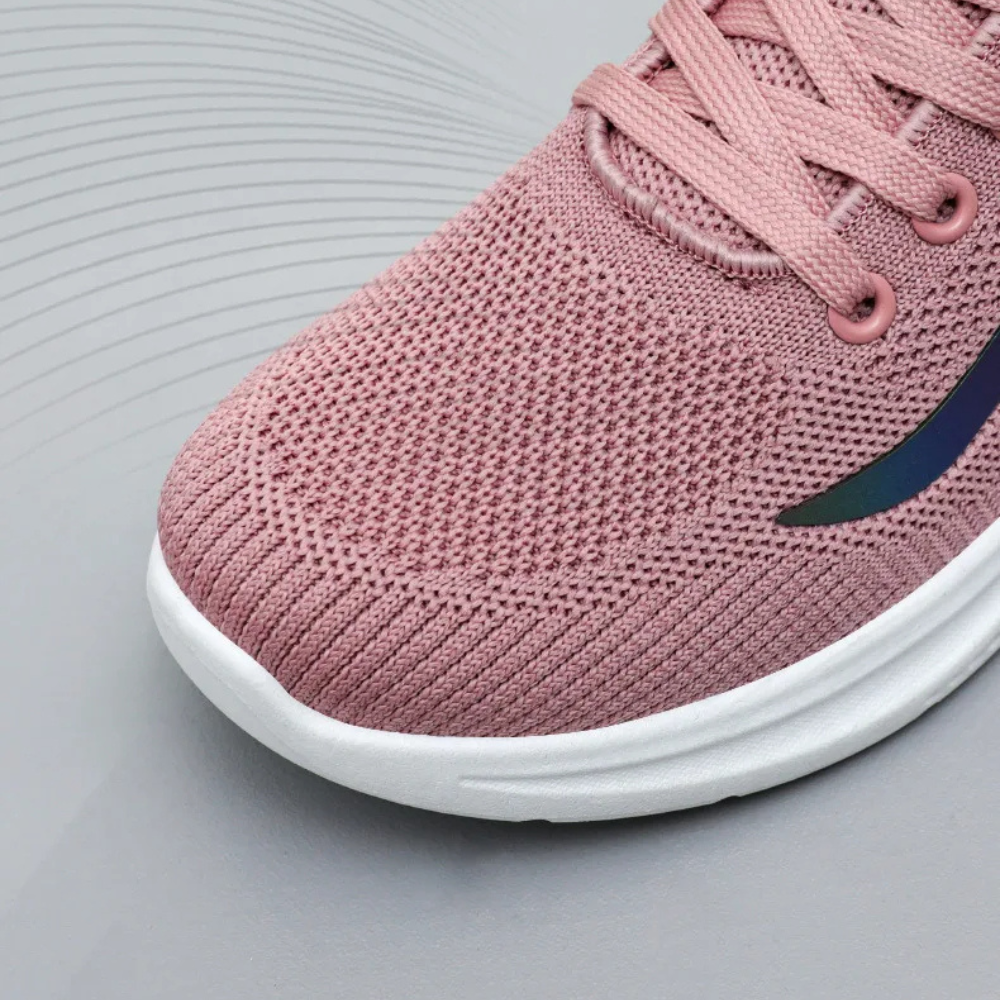 Rosa Damen-Sneaker mit weicher Sohle, atmungsaktivem Mesh-Obermaterial, modisch und bequem.