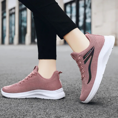 Damen Sneaker rosa, atmungsaktiv, weiche Sohle, ideal für Laufen und Freizeit.