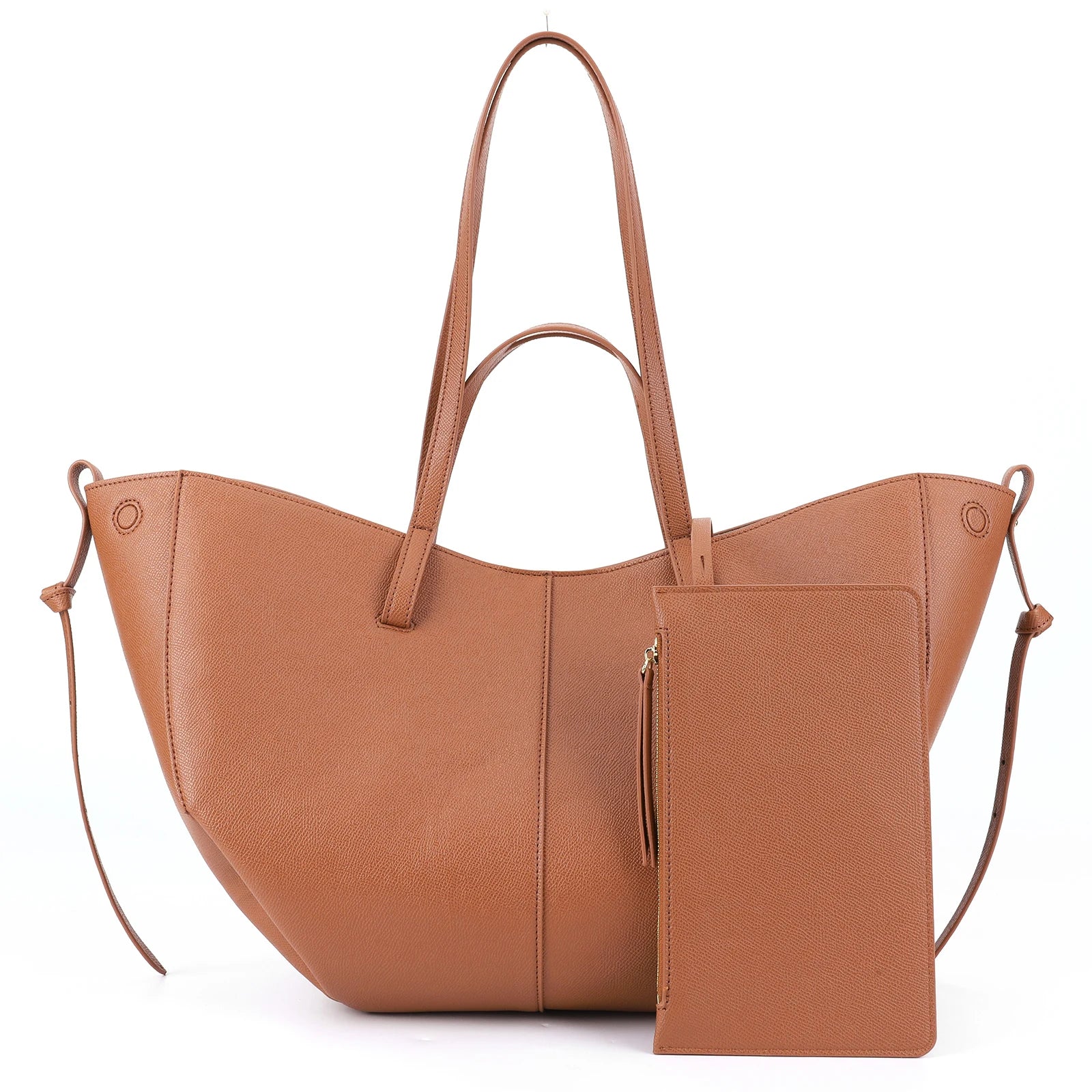 Kamelbraune Damenledertasche mit passender Clutch, elegant und geräumig.