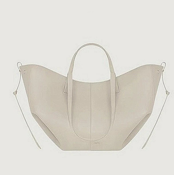 Weiße Damenhandtasche aus Leder, elegantes Design, geräumig, modisch, hochwertig.