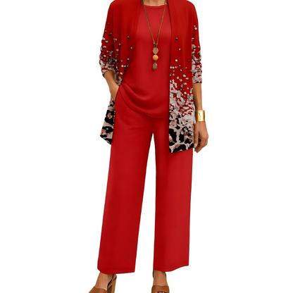 Set in Rot mit Cardigan, dessen Verlauf aus hellem Muster und Leopardenoptik zum Saum hin zunimmt, dazu Shirt und weite Hose. 5