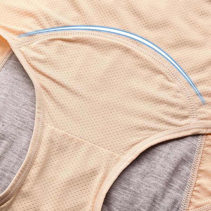 Detail des beigen Slips mit Netzstoff und gewölbtem Einsatz im Schritt, grauer Stoff an den Seiten sichtbar. 11