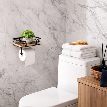 Halter in Weitwinkelansicht an grauer Marmorwand neben der Toilette, auf der Ablage steht eine kleine Grünpflanze. 3