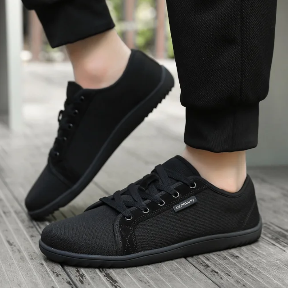 Schwarze Barfußschuhe für Herren, atmungsaktiv, rutschfest, ideal für Freizeit und Sport.